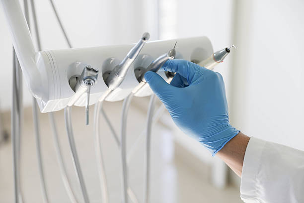 Professional Emergency Dentist technician working in Pine Island, TX
